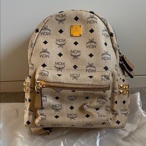MCM Tan Backpack with Gold Details